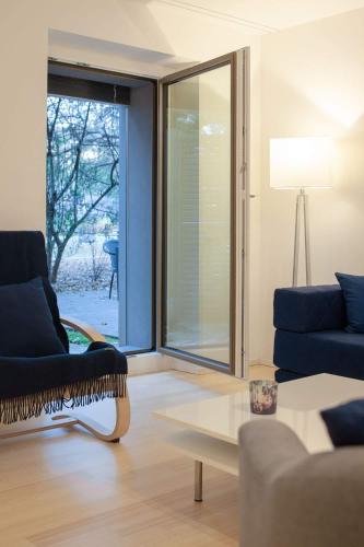 Sankt Alban Apartment | 2,5 Zi Design Loft Wohnung mit Gartensitzplatz
