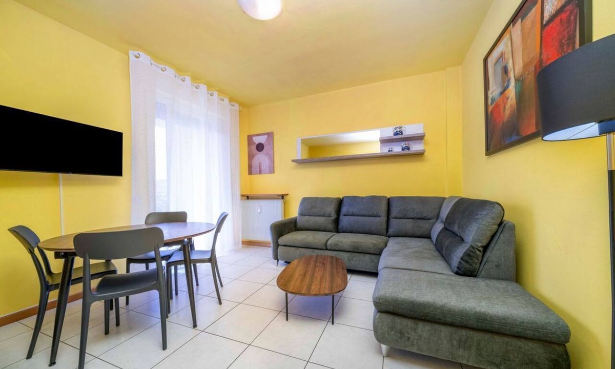 Colugna Apartment | A comfortable and welcoming 60 square meters apartment, perfect for four people, located on the fourth floor of a period building without an elevator.The property is located in a quiet area, allowing our guests to easily and quickly reach the center of U
