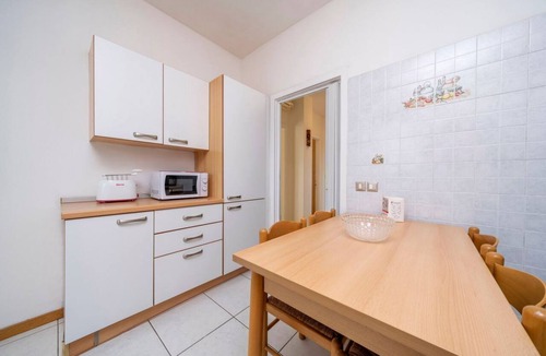 Colugna Apartment | A comfortable and welcoming 60 square meters apartment, perfect for four people, located on the fourth floor of a period building without an elevator.The property is located in a quiet area, allowing our guests to easily and quickly reach the center of U