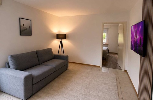 Biel Apartment | book2stay: Central Biel Apartment w/WiFi & modern Kitchen