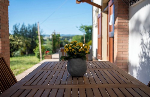 Brufa Apartment | Bright apartment in farmhouse with pool and view of Assisi