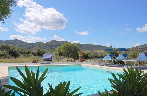 Loiri Porto San Paolo House | Casa Perella B: A graceful cottage surrounded by the greenery, with Free WI-FI.