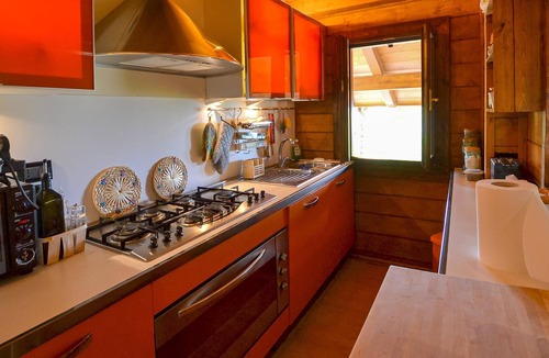Pieve Santo Stefano House | Charming wooden house, situated on a hill, between Florence and San Marino.