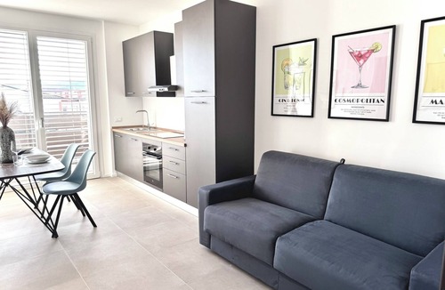 Sarnico Apartment | Cocktail Sarnico Color Suites Garage -Self check-2 min. from the lake and downtown