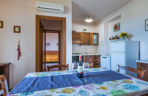 Castellina Marittima Apartment | Cosy apartment for 7 guests with A/C, WIFI, pool, TV, patio, pets allowed and panoramic view