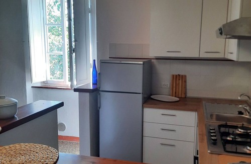 Rosignano Marittimo Villa | Cosy apartment in villa for 10 people with pool, TV and pets allowed