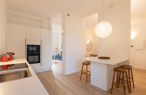 Porta Genova Apartment | Discover your new retreat in the heart of Milan!This spacious 3-bedroom, 2-bathroom flat, located in one of the city's most desirable areas, offers a perfect balance of comfort and style. Viale Papiniano is located in the Sant'Agostino district of Milan,