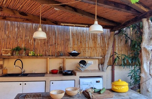 Seccheto House | Elegant Pomegranate house immersed in the nature of the Island of Elba.