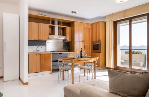 Ponte San Giovanni Apartment | GuestHost - Bright 80 sqm apartment that can accommodate up to 6 people, located near the Ponte San Giovanni station. It consists of a living room with kitchen and dining area, a bathroom and two bedrooms. The flat is located on the ninth floor and has a