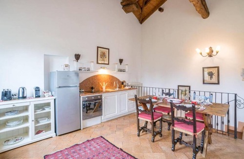 Villa Guardia Apartment | GuestHost - Confortable and stylish 90smq duplex apt that can accomodate up to 4 people located in a period building without a lift.Portion of private garden, large garden with shared pool and private parking space.Inside the building there is a historic