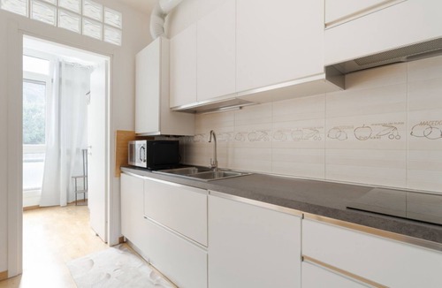 Quartiere Mazzini Apartment | GuestHost - Modern 64 sqm apartment located on the ground floor of a building (a few steps to access).The accommodation is located in the Corvetto area, a residential neighbourhood undergoing major regeneration, well served and with excellent key transpo
