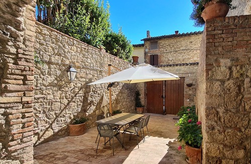 Cetona House | La Terrazza, Cetona, Tuscany, historic stone house with garden.