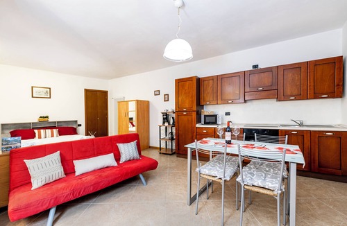 Visgnola Apartment | Located in the historic center of the hamlet of Visgnola, with a view of the patio.