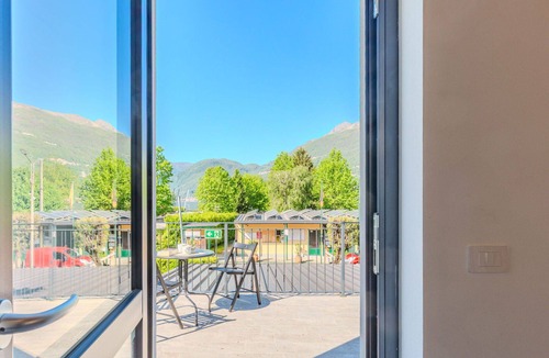 Dervio Apartment | Lovely apartment for 4 guests with A/C, pool, WIFI, TV, patio and panoramic view