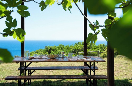 Roccamare House | Myrtle Apartment, 4 beds. Private garden with sea view