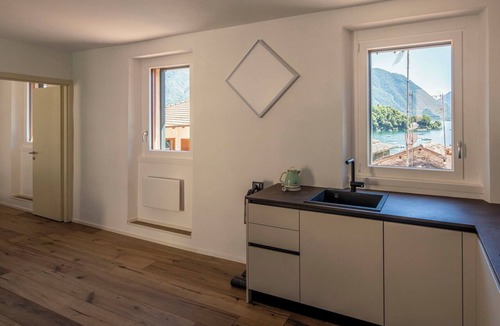 Ossuccio Apartment | Next Comacina, Garage by Geco Vacation Rentals