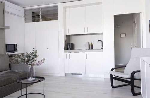 Bissone Apartment | Nice apartment for 4 people with WIFI, pool, A/C, TV, balcony and panoramic view