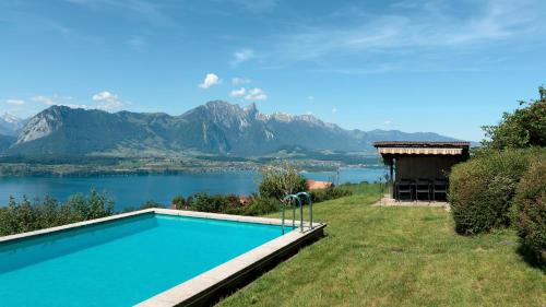 Aeschlen ob Gunten Ski Chalet | Private Chalet with Pool, Lake & Mountain Views