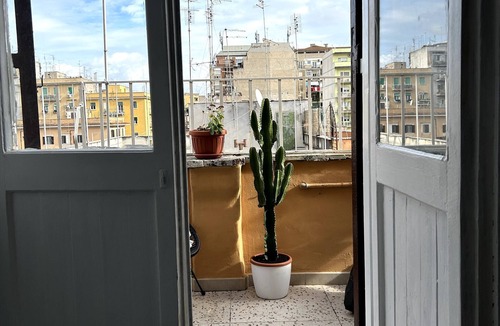 Tuscolano Apartment | Small attic with romantic terrace in the heart of Torpignattara.