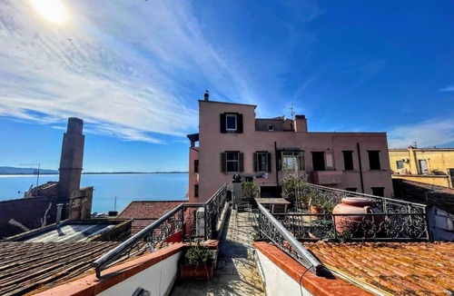 Orbetello Apartment | Spacious historic apartment with rooftop terrace