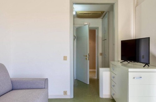 Marina di Cecina House | Studio apartment of approximately 20 m2 composed of a living room with kitchenette equipped with 2 induction hobs, small fridge, sink,satellite TV and sofa.Sleeping area separated by sliding door with double bed, bathroom with shower without window.Air c