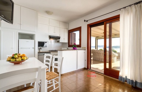 Porto Taverna Apartment | Stunning view near the beach with large panoramic veranda MOLARA house