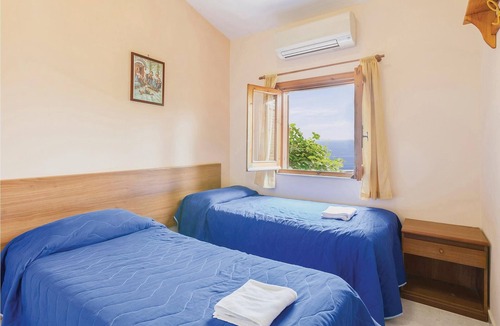 Monte Chiaro Apartment | This modern bungalow belongs to a vacation home complex directly above the sea, with a unique panora