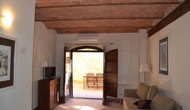 Apartment with balcony in medieval village with swimming pool, tennis, in the countryside near the sea and services