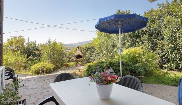 Apartment 'Trilocale Bonalaccia 3' with Shared Pool, Garden, and Wi-Fi
