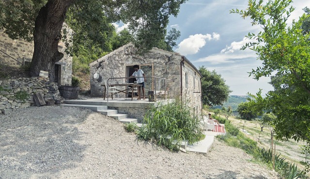 authentic home with enchanting views of the valley and far sea view