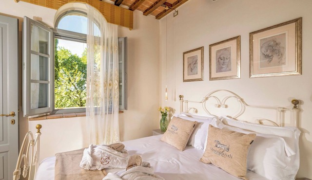 Elegant Tuscan Apartment with Fireplace and Countryside Views