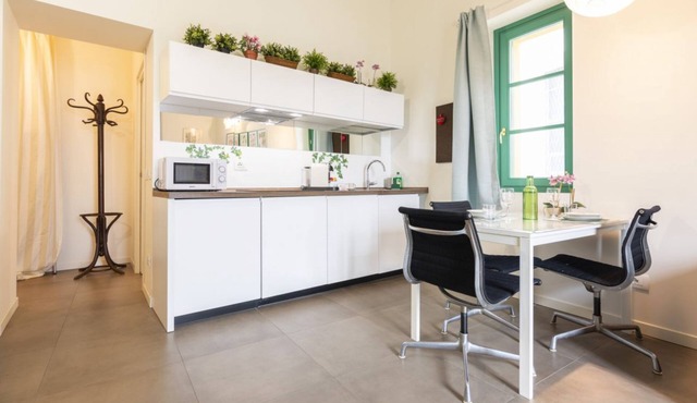 GuestHost - Just a few minutes on foot from the center of Gorgonzola, Casa Nina is a two-level apartment, converted from an ancient courtyard typical of Lombard villages from the early 1900s. It features a quaint bedroom for two on the mezzanine and a co