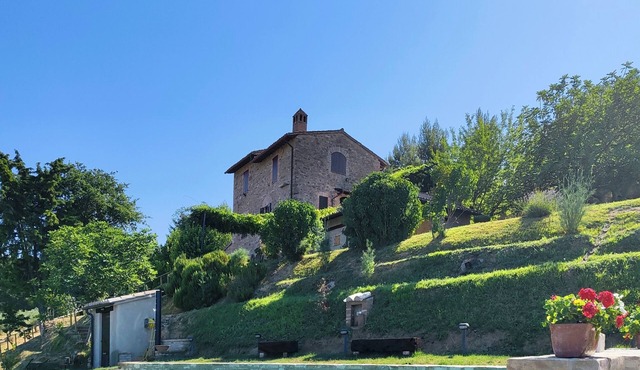 In a large park and with a swimming pool with spectacular views of the valley.