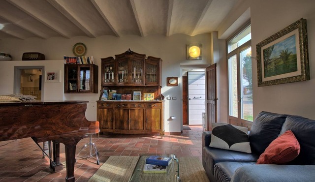 Large historic villa with pool, panoramic views surrounded by greenery in Ostra