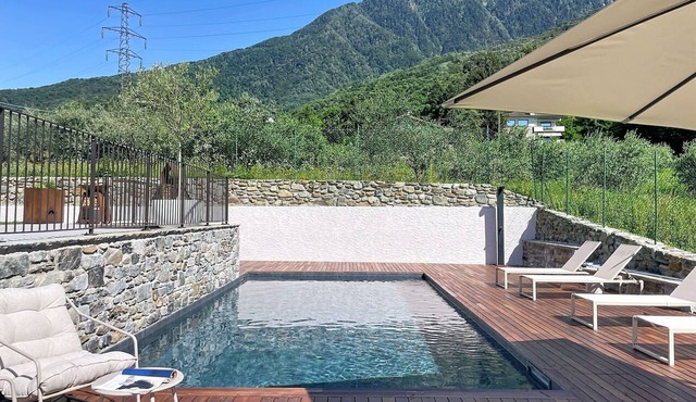 Stunning private villa for 8 people with WIFI, hot tub, private pool, TV and terrace in Colico