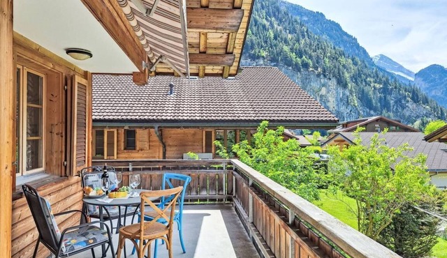 Sunny alpine place in middle of Bernese Oberland, mountain views, hiking trails.