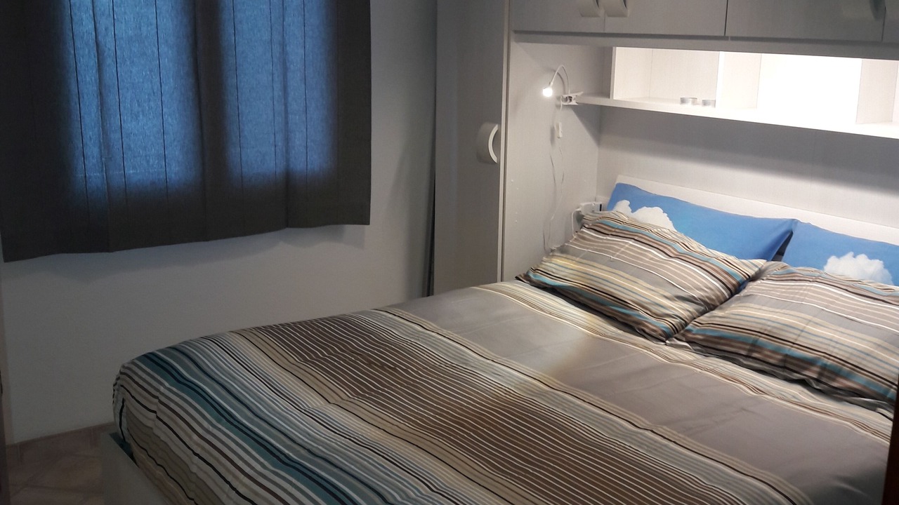 Photo of Bedroom in Case Peschiera-Lu Fraili
