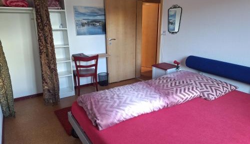 Queen Room with Shared Bathroom