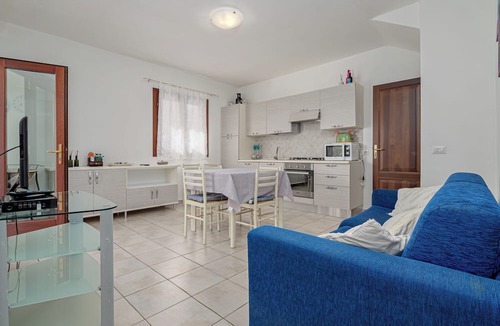Schifoni Villa | Villa 'Villetta Budoni Lutturai' with Sea View, Private Terrace and Air Conditioning