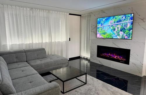 Heimberg Apartment | Modern 3BR Apartment with Fireplace, Miele Kitchen and Balcony