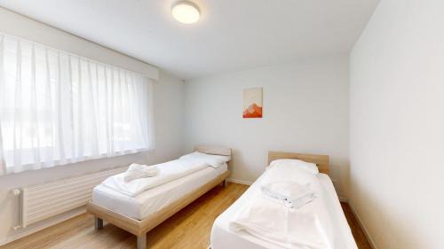 Davos-Platz Apartment | Großzügige 4 Schlafzimmer Wohnung in Davos Bergblick zentrale Lage
