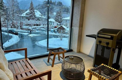 Central Interlaken Apartment | Modern Apartment with Balcony and BBQ at Interlaken West Station