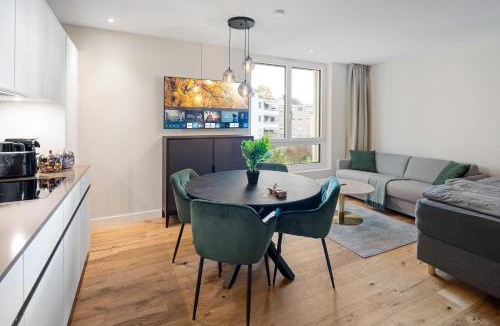 Embrach Apartment | Visionary Hospitality Embrach, Zürich - Premium Apartments with Free Parking, Washer, Kitchen, Rooftop Terrace, Lounge, Bus Stop, Train Station, 15' Airport