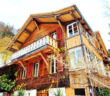 Sundlauenen Apartment | Romantic Alpine Farmhouse with Superview of Lake Near Interlaken