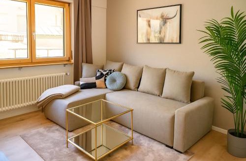 Leukerbad Apartment | Ambiente Appartement C2 - moderne Ferienwohnung mit Terrasse in Leukerbad