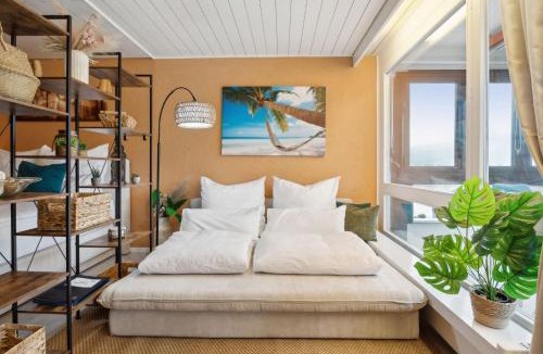 Ingenbohl Apartment | ReMo I 4 Seasons Apartment I 1-4 Personen I See, Bergsicht I 65' Smart TV, Tischkicker und Badewanne I Parkplatz