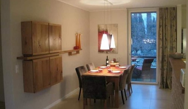 Exclusive flat, on Lake Lugano, with outdoor pool