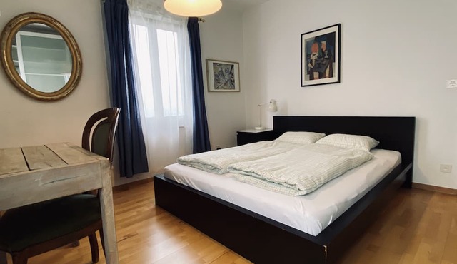 Maisonnette apartment in the city on 2 floors.